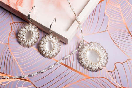 Bookmark for a book made of beads. Bead decoration. Handmade work. Read a book.の写真素材