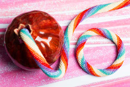 Bookmark for a book made of beads. Bead decoration. Handmade work. Read a book.の写真素材
