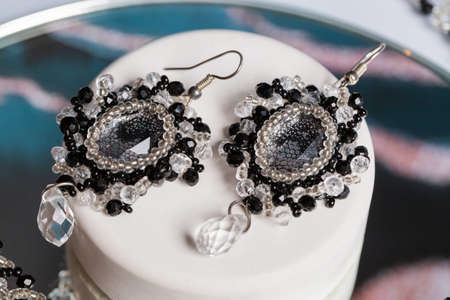 Bookmark for a book made of beads. Bead decoration. Handmade work. Read a book.の写真素材