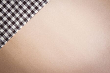 brown table striped Fabric on brown paper backgroundの写真素材