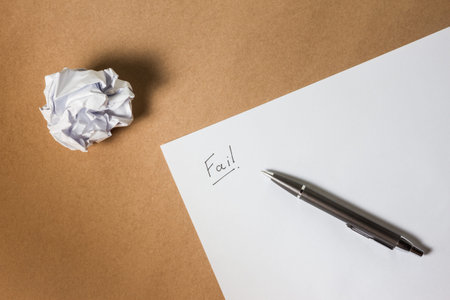Fail hand writing on paper, pen and crumpled paper. Business frustrations, Job stress and Failed...