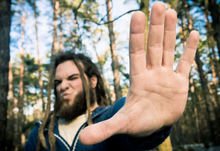 The guy with dreadlocks protestsの写真素材