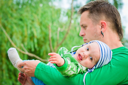 A child wiht his fatherの写真素材