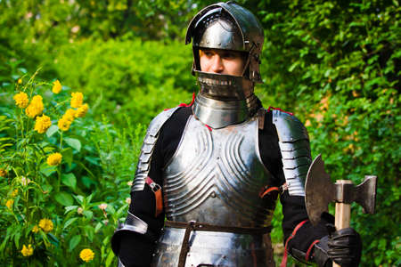 knight in shining armor on a green backgroundの写真素材