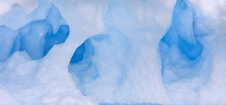 Large Arctic iceberg with a cavity insideの写真素材