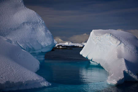 Antarctic iceberg in the snowの写真素材