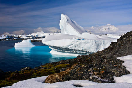 Huge iceberg in Antarctica, blue sky, azure water, sunny dayの写真素材