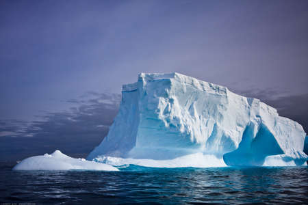 Antarctic iceberg in the snowの写真素材