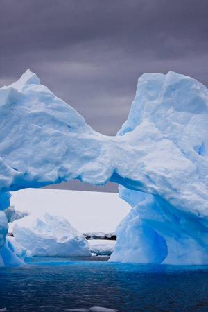 Large Arctic iceberg with a cavity inside