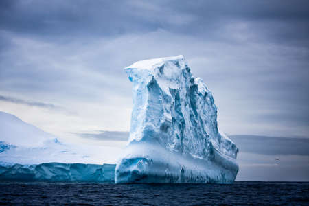 Antarctic iceberg in the snowの写真素材