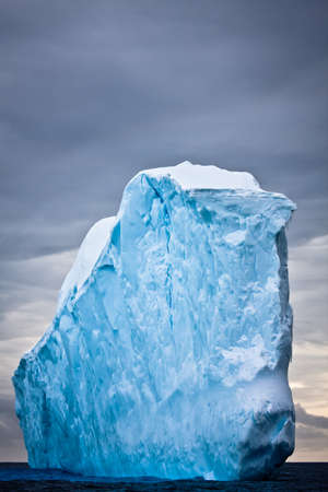 Antarctic iceberg in the snowの写真素材