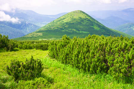 Mountains landscape with clouds and blue skyの写真素材
