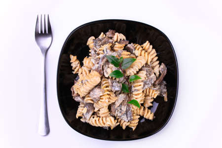 Cooked  pasta with meat and mushroomsの写真素材