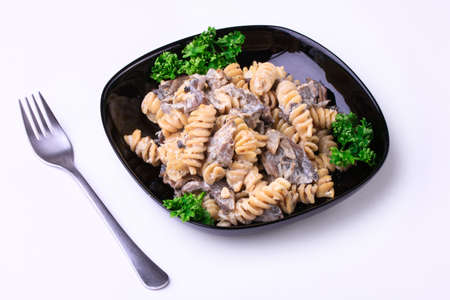 Cooked  pasta with meat and mushroomsの写真素材
