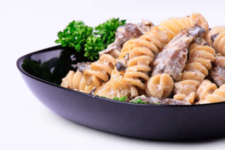Cooked  pasta with meat and mushroomsの写真素材