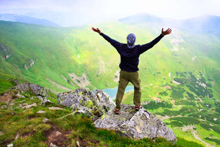 Beautiful mountains landscape with lake  in Carpathian mountains and manの写真素材