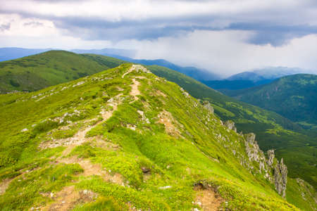 Mountains landscape with cloudsの写真素材