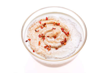 Creamy mushroom soup isolated on whiteの写真素材