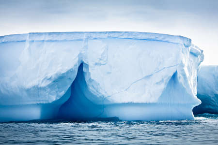 Antarctic iceberg in the snowの写真素材