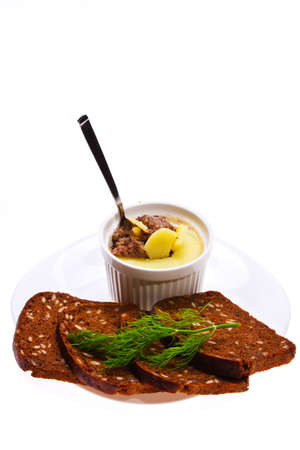 delicious pate with bread isolated on whiteの写真素材