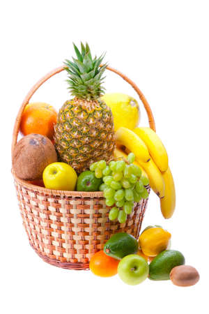 wicker basket full of ripe fruitの写真素材