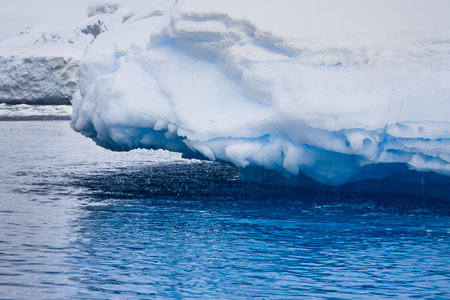 Antarctic glacier in the snow. Beautiful winter background.の写真素材
