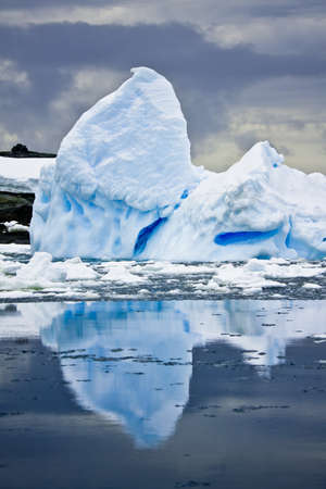 Antarctic iceberg in the snow. Beautiful winter background.の写真素材