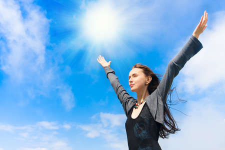 portrait of a young woman enjoying a freedomの写真素材