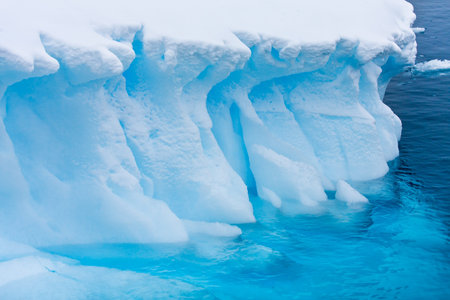Antarctic glacier in the snow. Beautiful winter background.