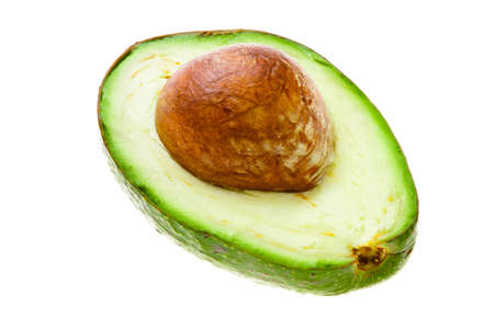 half of an avocado on a whiteの写真素材