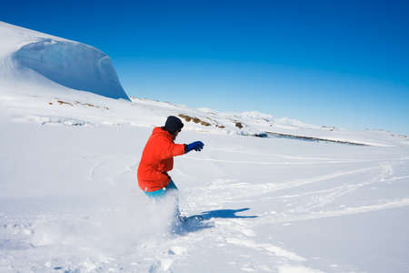 Man moves on skis. Glacier in background. Antarcticaの写真素材