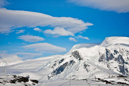 Beautiful snow-capped mountains. Beautiful winter background.の写真素材