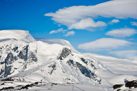 Beautiful snow-capped mountains. Beautiful winter background.の写真素材