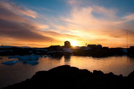 Summer  sunset in Antarctica.  Beautiful winter background.の写真素材