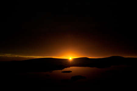 Summer  sunset in Antarctica.  Beautiful winter background.の写真素材