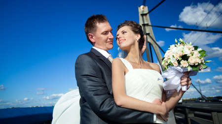 Bride and groom on the bridgeの写真素材