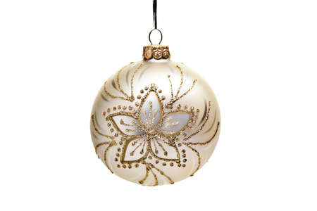 Closeup image of golden Christmas toy, isolated on white backgroundの写真素材