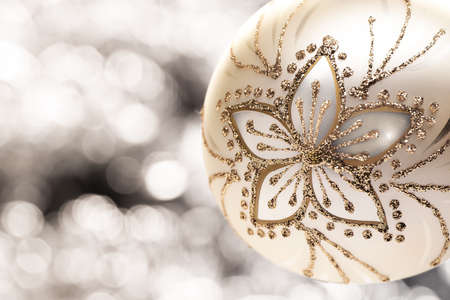 Closeup image of a golden Christmas toyの写真素材