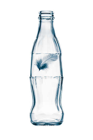 bottle with feather isolated on the white backgroundの写真素材