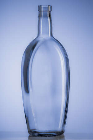 bottle on the blue backgroundの写真素材