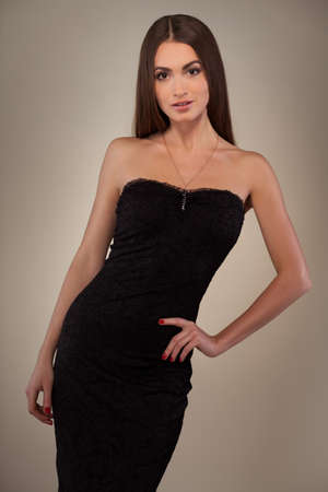 portrait of a beautiful girl in black dressの写真素材