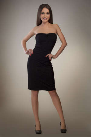 portrait of a beautiful girl in black dressの写真素材