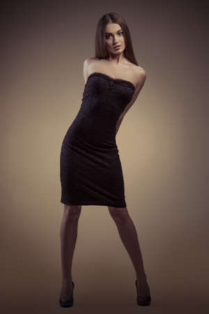 portrait of a beautiful girl in black dressの写真素材