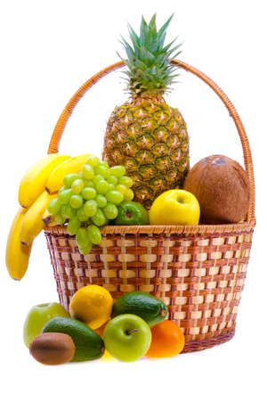 wicker basket full of the ripe fruitの写真素材