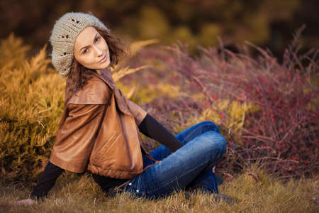 young girl in autumn parkの写真素材