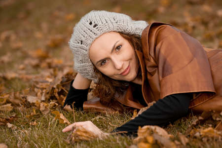 young girl in autumn parkの写真素材