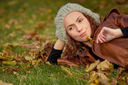 young girl in autumn parkの写真素材