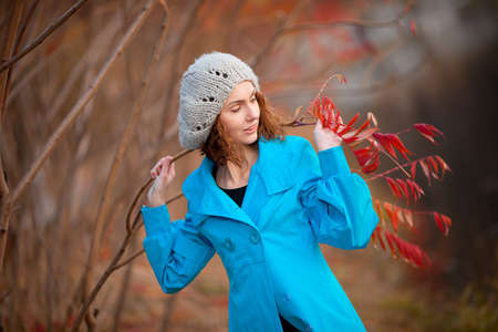 young girl in autumn parkの写真素材