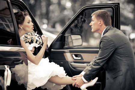 Wedding couple embracing each other moment of joyの写真素材