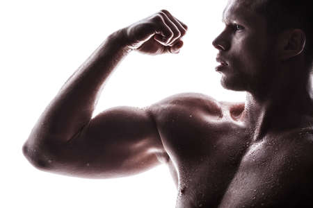 Handsome athlete on a white backgroundの写真素材